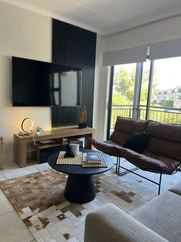 Lounge TV wall and sofa