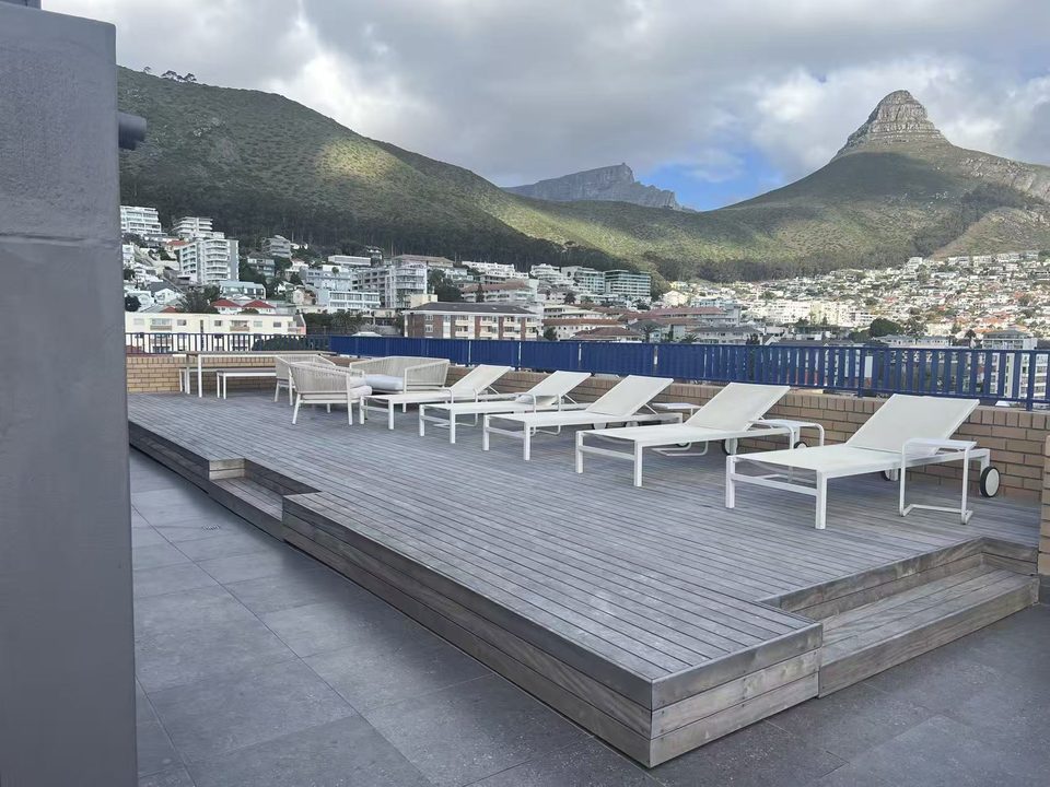 Rooftop sun loungers with Lion's Head behind